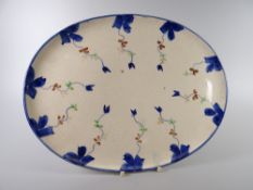 A LLANELLY POTTERY OVAL CABARET TRAY painted with blue stylized flowers, black Llanelly Art