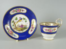 A FINE NANTGARW PORCELAIN CUP & SAUCER the footed cup with inverted heart-shaped handle curving over
