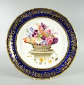 A SWANSEA PORCELAIN PLATE FOR THE 'LYSAGHT' SERVICE the interior decorated with a large basket of