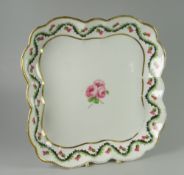 A NANTGARW PORCELAIN DISH of lobed square form and being border decorated in the Scottish style with