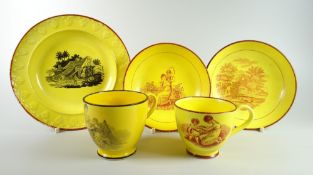 A SWANSEA CANARY YELLOW PLATE & TWO SIMILAR CUPS & SAUCERS the plate with moulded border within an