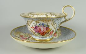 A NANTGARW PORCELAIN CUP & SAUCER London decorated with panels of garden flowers on a pale mauve