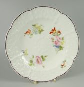 A NANTGARW LOBED CRUCIFORM PLATE with three sprays of flowers to the interior, the border and centre