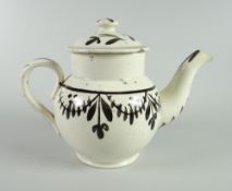 A RARE SWANSEA BACHELOR TEAPOT with simple black painted floral decoration, 10cms high Condition