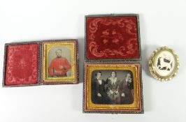 A DAGUERREOTYPE PHOTOGRAPH OF RICHARD & ROBERT DEWSBERRY & THEIR MOTHER in a folding picture frame