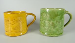 TWO EWENNY POTTERY MUGS one in yellow ground inscribed 'Pentyrch & Gwaelod y Garth Jubilee GR