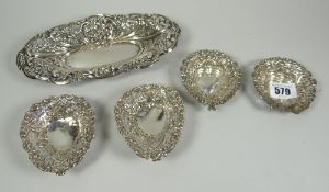 A fine quality Victorian pierced floral silver dish, Birmingham 1897 together with a set of four