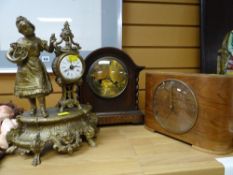 A polished barley-twist clock, a mid century veneered table clock & a gilt spelter figural clock