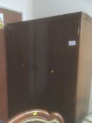 Vintage mahogany veneered two-door wardrobe with a single-drawer base