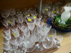 A large parcel of glassware including drinking glasses, fruit bowls, cut glass etc