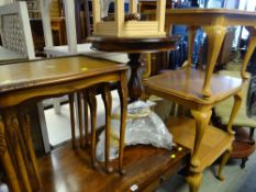 A parcel of tables including circular topped table, nest of three coffee tables with tooled