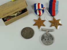 A WWII medal replacement group for Mr R J Howells-Jones with original box and papers, comprising