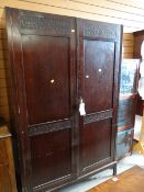A vintage two-door wardrobe & glass bookcase