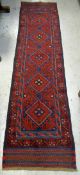 A mainly blue & red Meshwani runner, 258 x 65cms