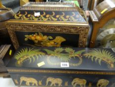A reproduction Indian-style box together with a larger reproduction sarcophagus-shaped casket