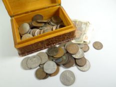 A leather bound lightwood cigarette box with coinage & two bank notes