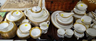 A large quantity of various gilt & white tea and dinnerware including Wedgwood 'Senatur', Royal