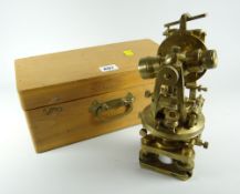 A boxed brass maritime scientific instrument incorporating compass and viewer