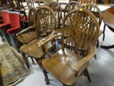 A set of 4+2 reproduction wheel & spindle back dining chairs on cabriole supports