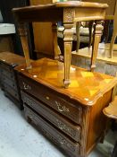 A reproduction chest of three drawers & a similar coffee table