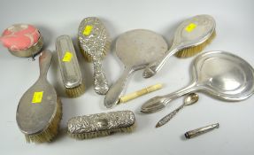 A parcel of silver-backed dressing-table items, a silver-based pin-cushion etc