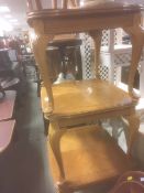 Three matching square oak effect tables