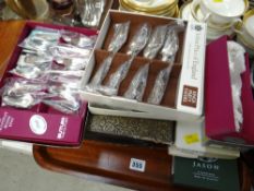 A parcel of boxed cutlery