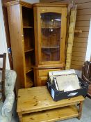 A parcel of modern pine furniture including corner cabinets, open bookcase, Long John coffee table
