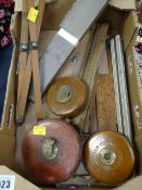 A parcel of vintage tape-measures & draughtsman's rulers etc