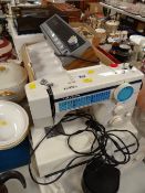 A Toyota electric sewing machine, an Alba tape machine etc