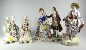 A parcel of Continental porcelain ornaments including a poultry-seller figurine, a courting couple &