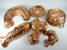 Five copper jelly moulds etc
