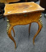 A delicate antique walnut & ormolu cross banded teapoy on bow supports with beaded border, 42cms