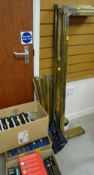 A brass fender & brass stair rods together with fittings & screws
