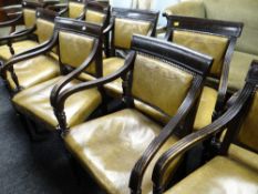 A set of ten studded leather boardroom / drawing room armchairs