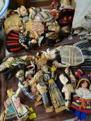 A collection of vintage souvenir dolls