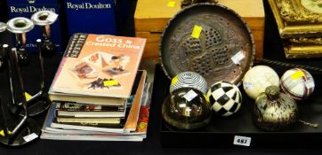 Parcel of collector's reference books, modern ceramic sphere ornaments, ornamental copper chestnut-