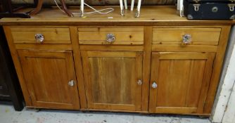 A vintage pine dresser base