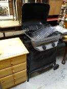 A gourmet barbecue & pine narrow chest of four drawers