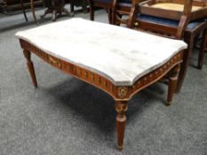 A grey marble French-style Long John reproduction coffee table