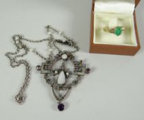 A colourful pendant on a white metal chain, a modern 9ct yellow gold green stone ring