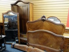 A continental mirrored armoire with matching bed ends (for assembly)