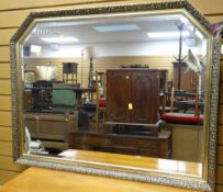 A large modern gilt & carved decorated wall mirror