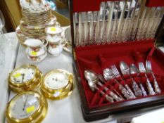 An incomplete canteen of Community cutlery & three maritime-type brass effect instruments