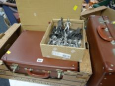 A vintage overnight suitcase, a box of metallic figural chess pieces & a chess board, pottery dish &