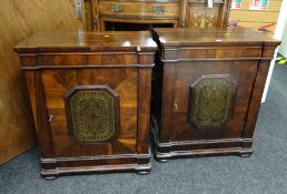 A pair of antique rosewood architectural form side cabinets with foliate brass inlay to a centre