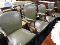 A set of eleven studded leather boardroom chairs