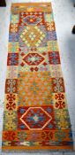 A vegetable dye wool Choli Kilim runner, 193 x 62cms