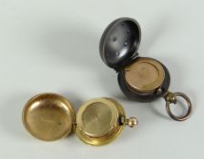 A 9ct yellow gold sovereign holder, 16gms together with a black enamel turquoise decorated