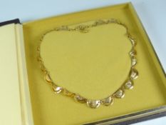A 9ct yellow gold crescent link necklace, 13.2grms